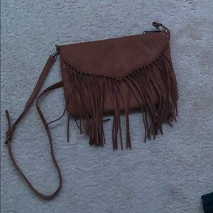 A Brown Purse with Tassles